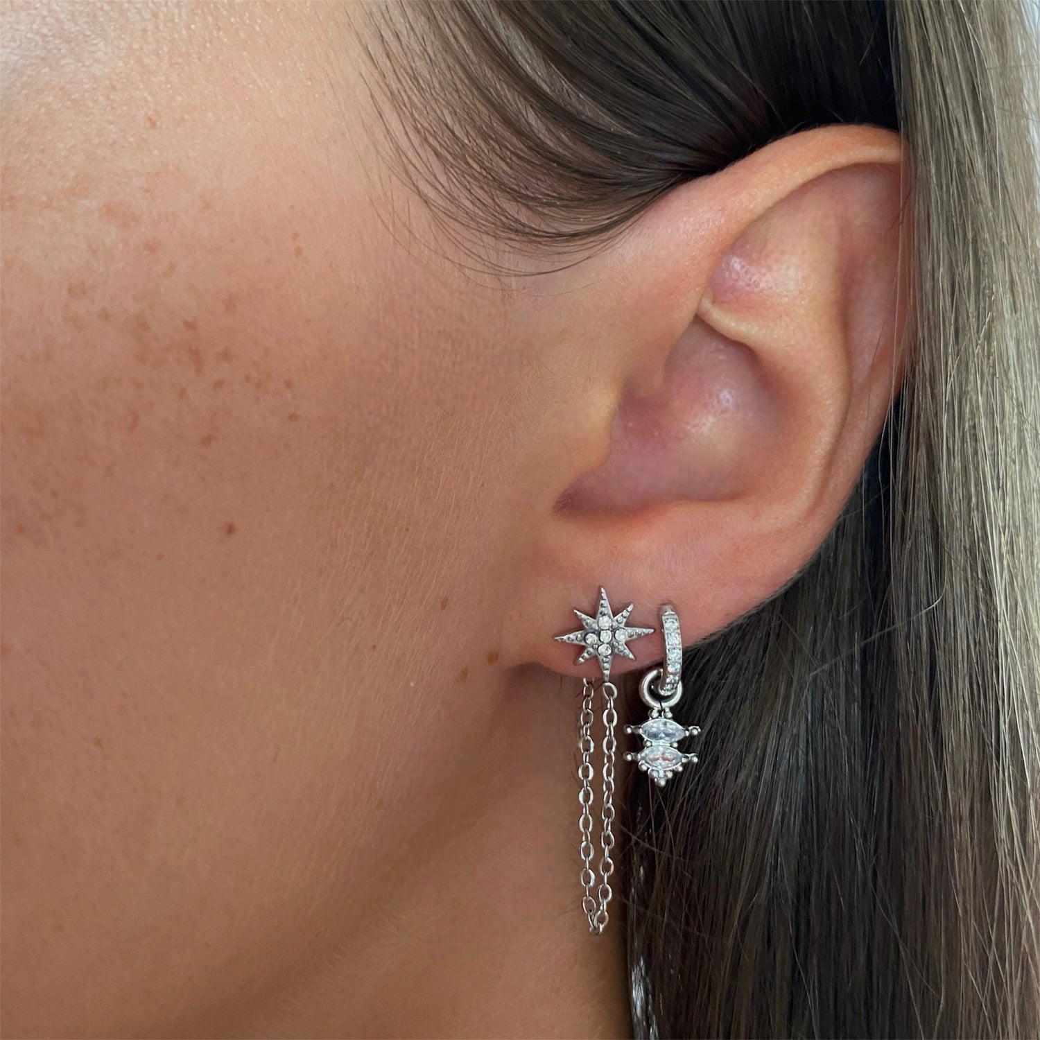 Boucles d’oreilles étoile strass pendantes en acier argenté pour femme
