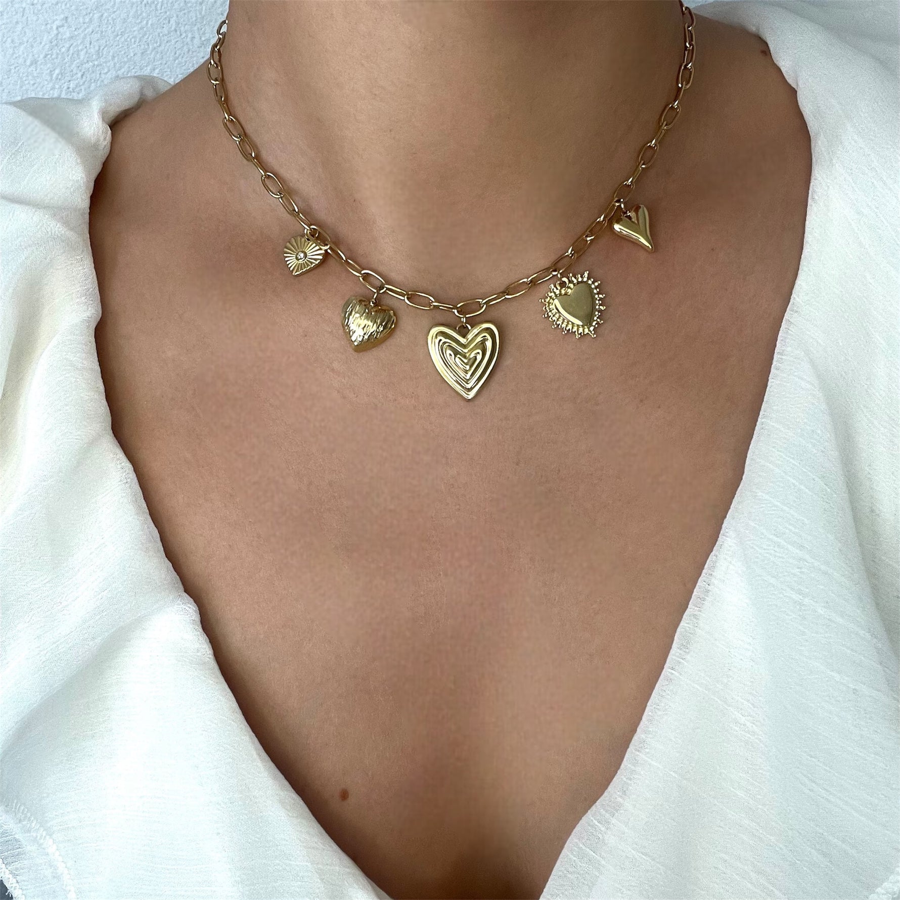 Collier breloques cœurs femme 