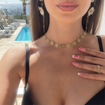 Collier ras du cou composé de fleurs doré en acier inoxydable tendance pour femme 