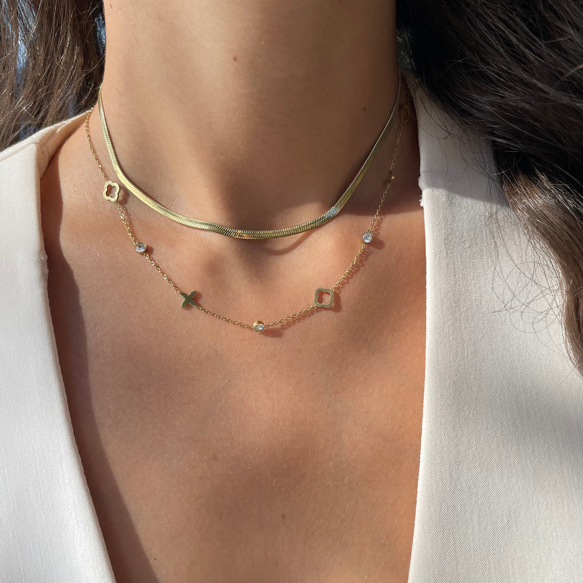Collier trèfles et étoiles en acier doré pour femme