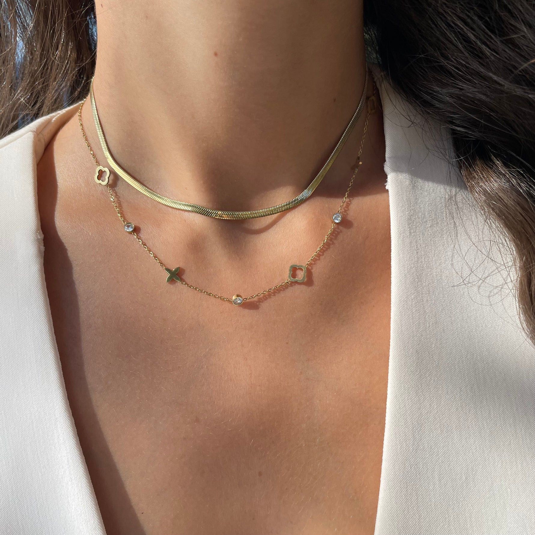 Collier trèfles et étoiles en acier doré pour femme