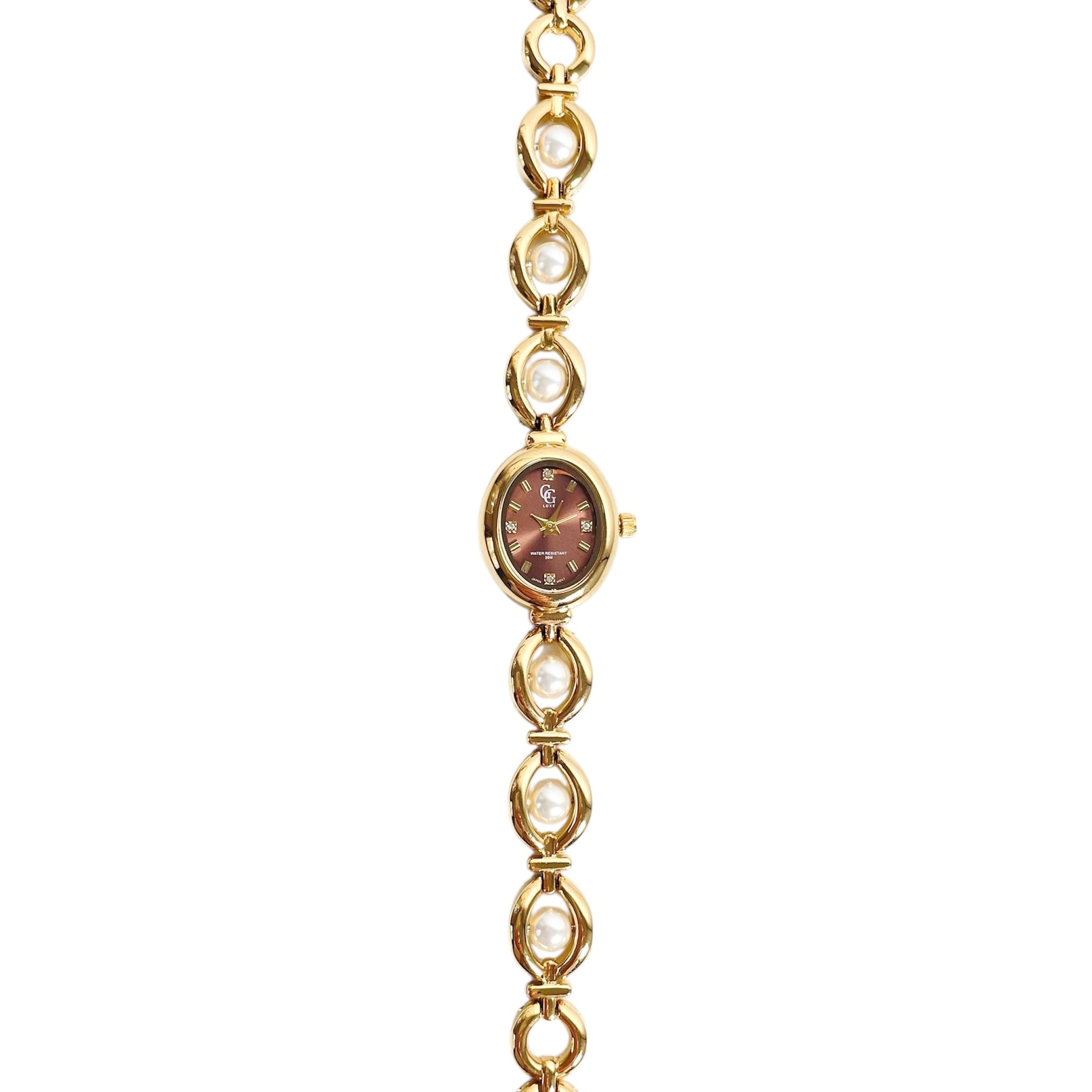 Montre élégante doré cadran ovale marron à quartz analogique et bracelet perles blanche pour femme 